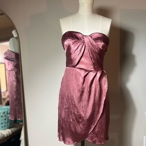 Size medium dress. Has built in shorts. New with tags